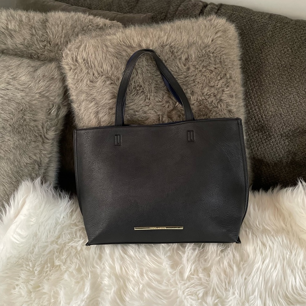 Black and dark blue Steve Madden bag.